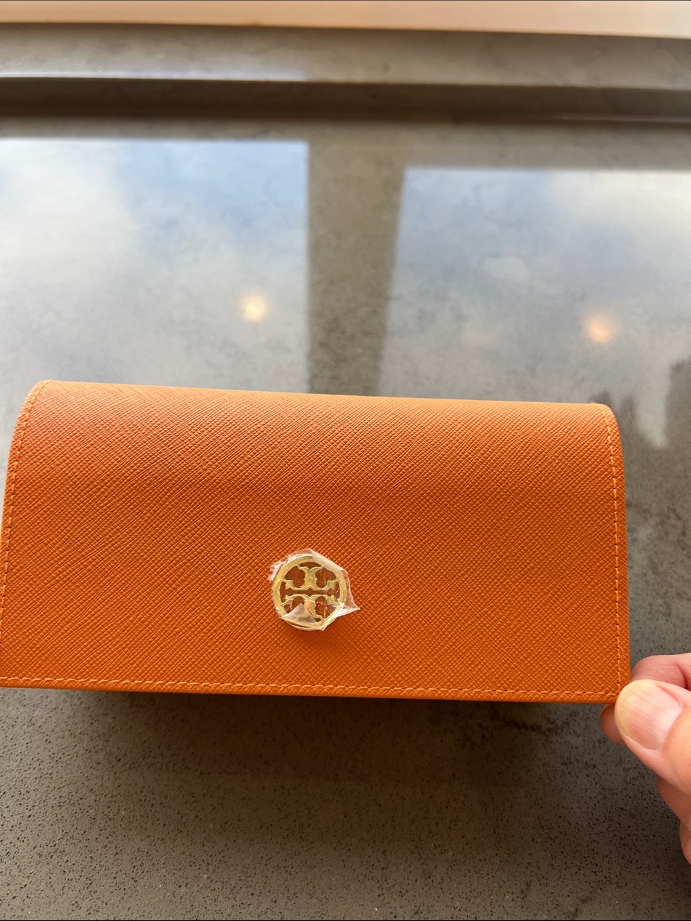 Tory Burch Orange glass case